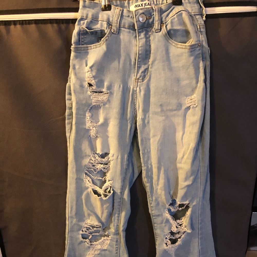 Woman’s light wash boot cut jeans